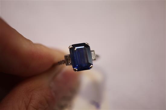 A mid 20th century platinum, sapphire and diamond ring, size 0.